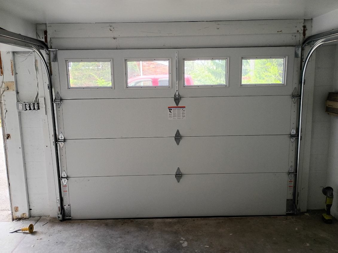 Insulated door with windows